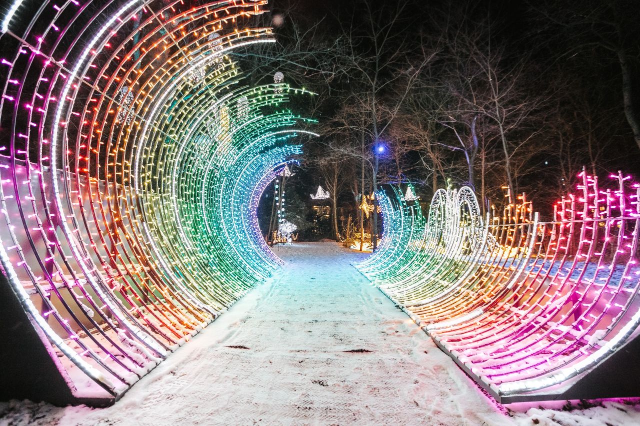 Festive city christmas lighting installation by MK Illumination at LUMAGICA Innsbruck — public space lighting design connecting people and city life.